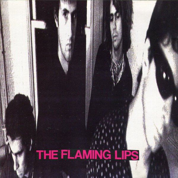 IN A PRIEST DRIVEN AMBULANCE