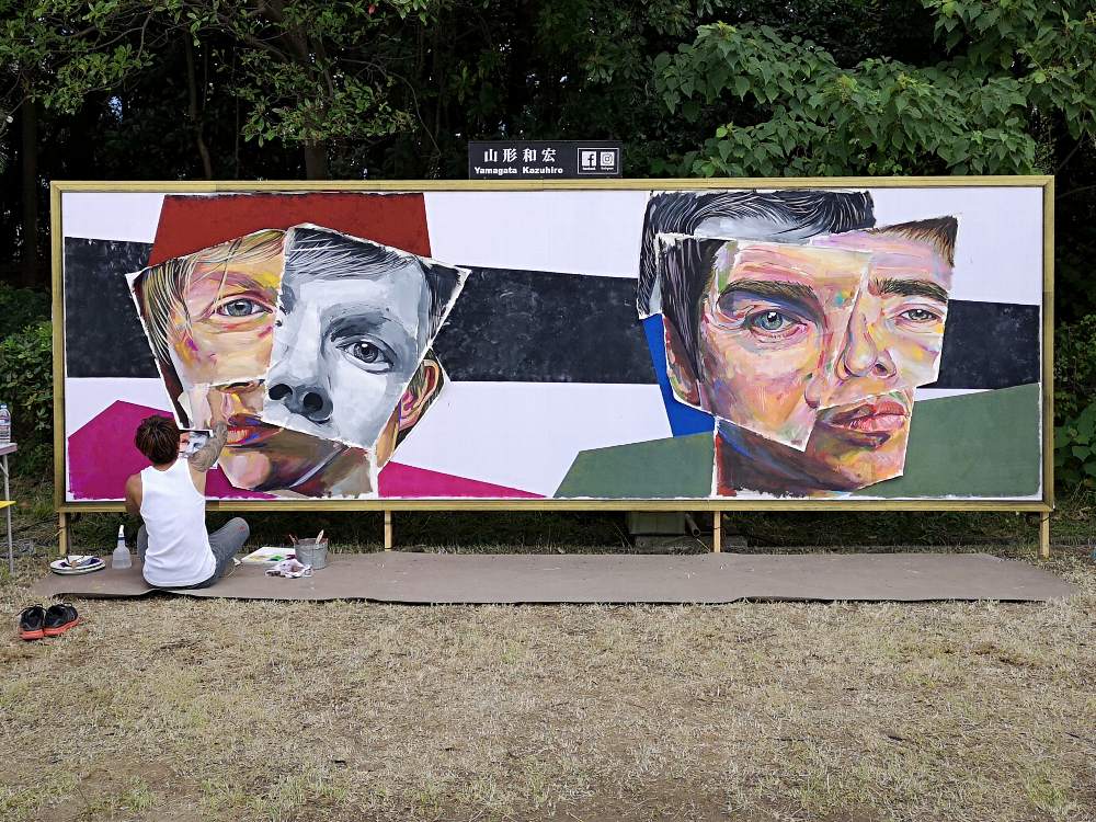 2日目。右がノエル・ギャラガー、左がベック。